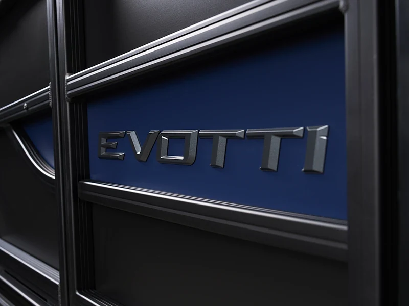 Evotti badge inset into dark pontoon side paneling