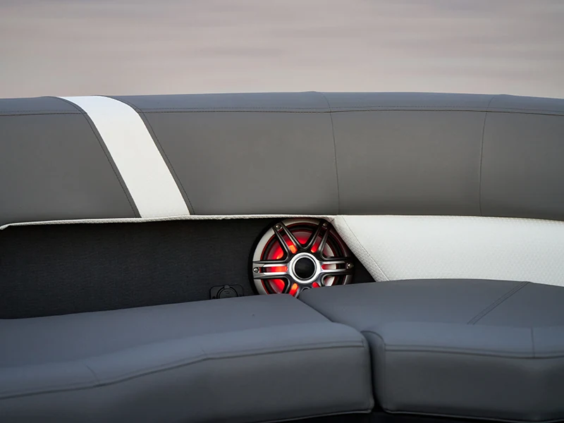 Contrasting upholstery and integrated speaker aboard an Evotti 500 Series pontoon