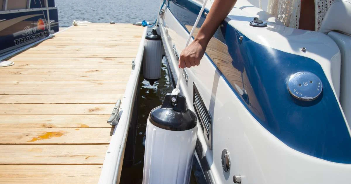 Taylor Made boat fender hanging alongside a boat