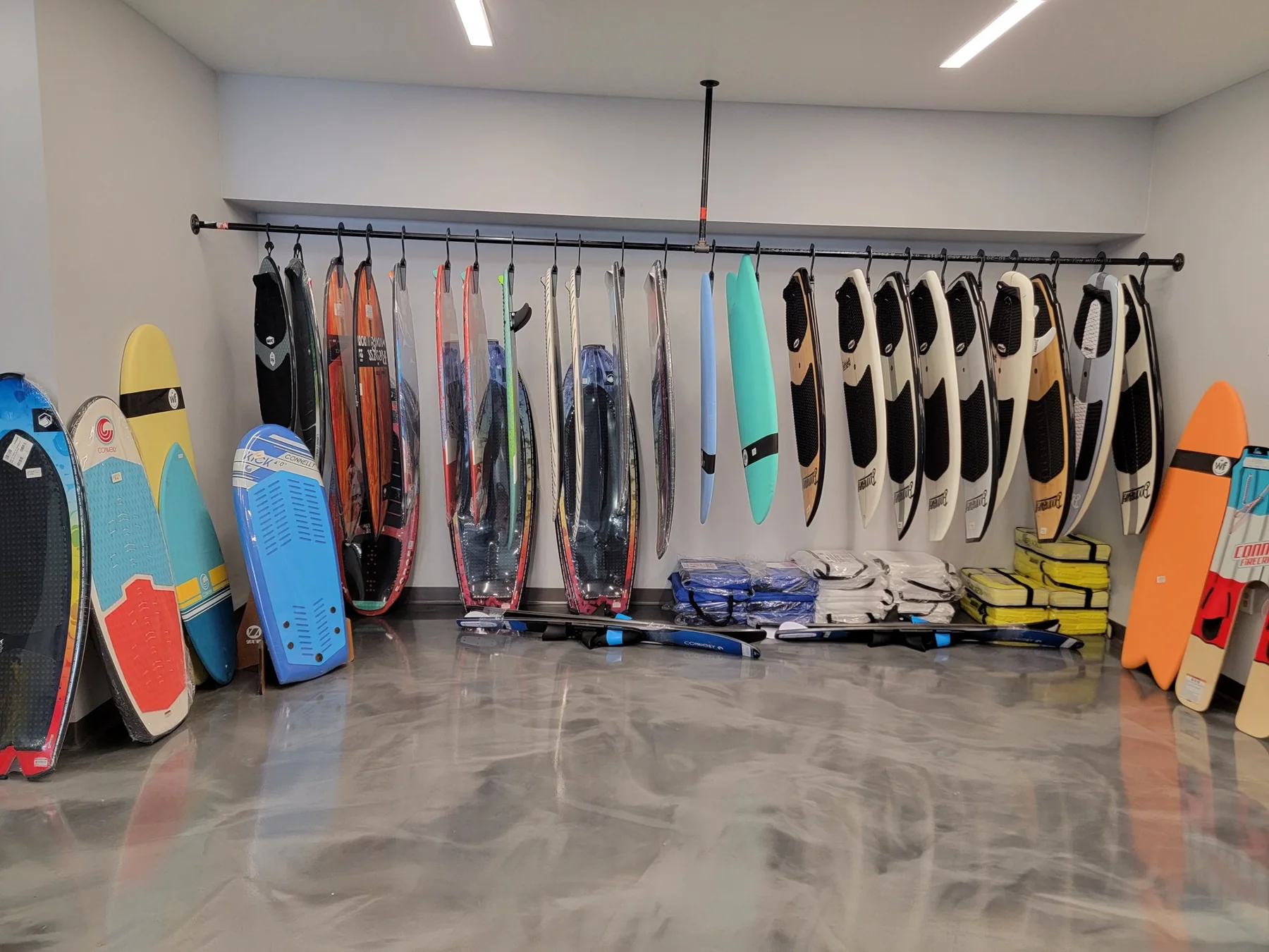 Wakeboards and water-sports gear displayed inside the Nashville Boating Center Pro Shop